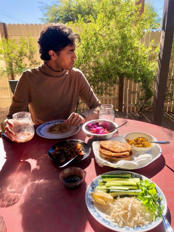 Photograph of Kunal eating a meal in Tucson, AZ