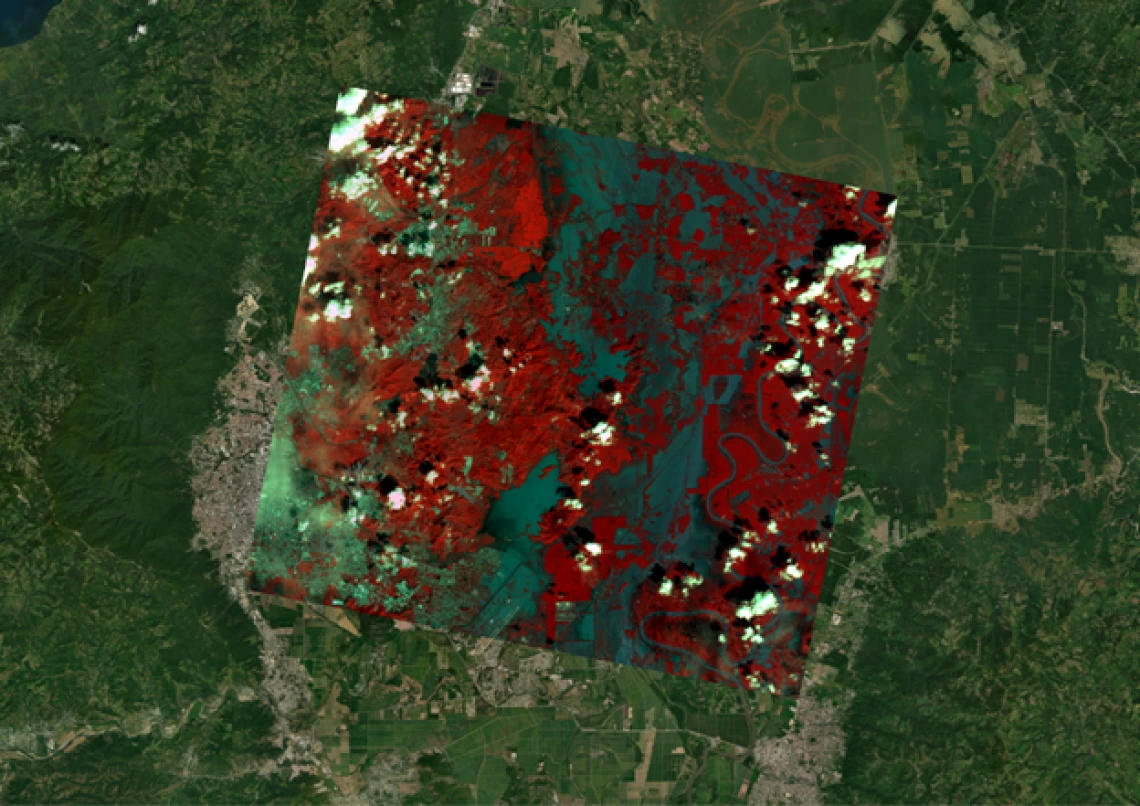 A false-color satellite image showing the extent of flood waters post-flood event, Cortés/Yoro, Honduras.