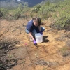 Lois Polashenski Taking a ground sample